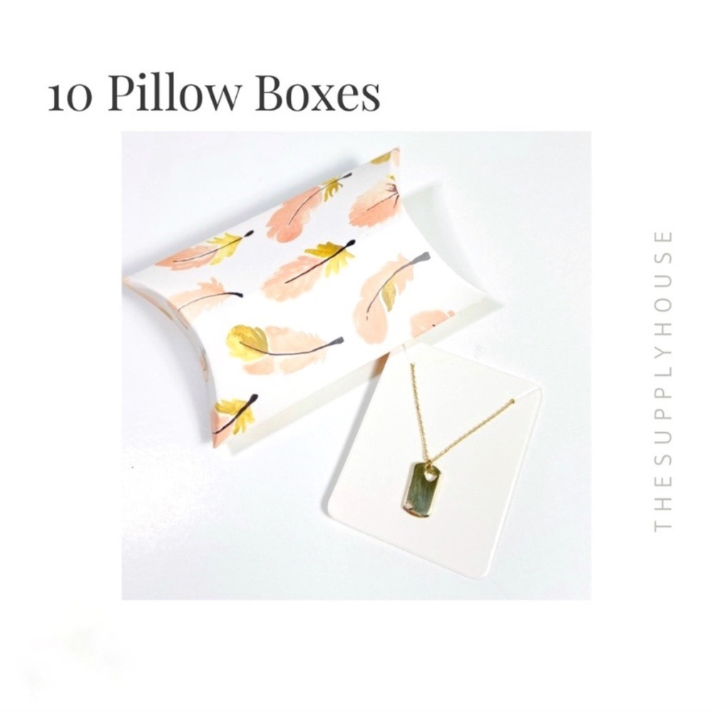 Pillow boxes with insert cards for jewelry.